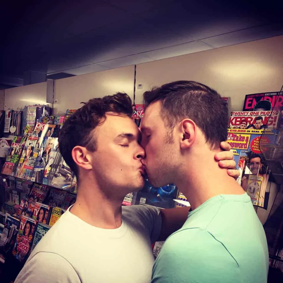 Couples stage kiss-in in London supermarket